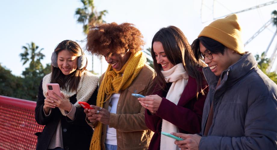 Gen Z renters searching for apartments on their phones